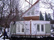 Modular home being set.